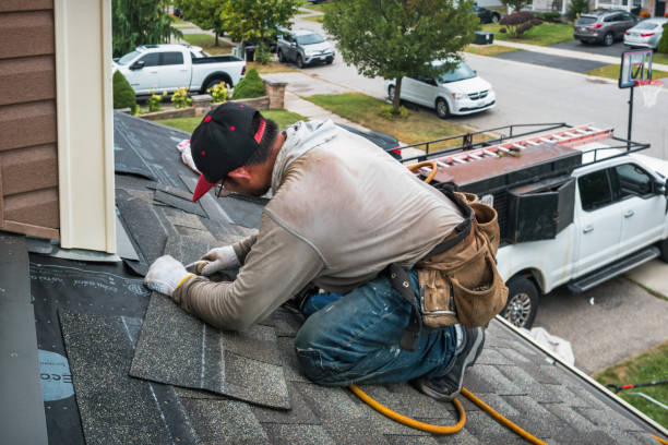 Professional Roofing technician working in Meridale, NY